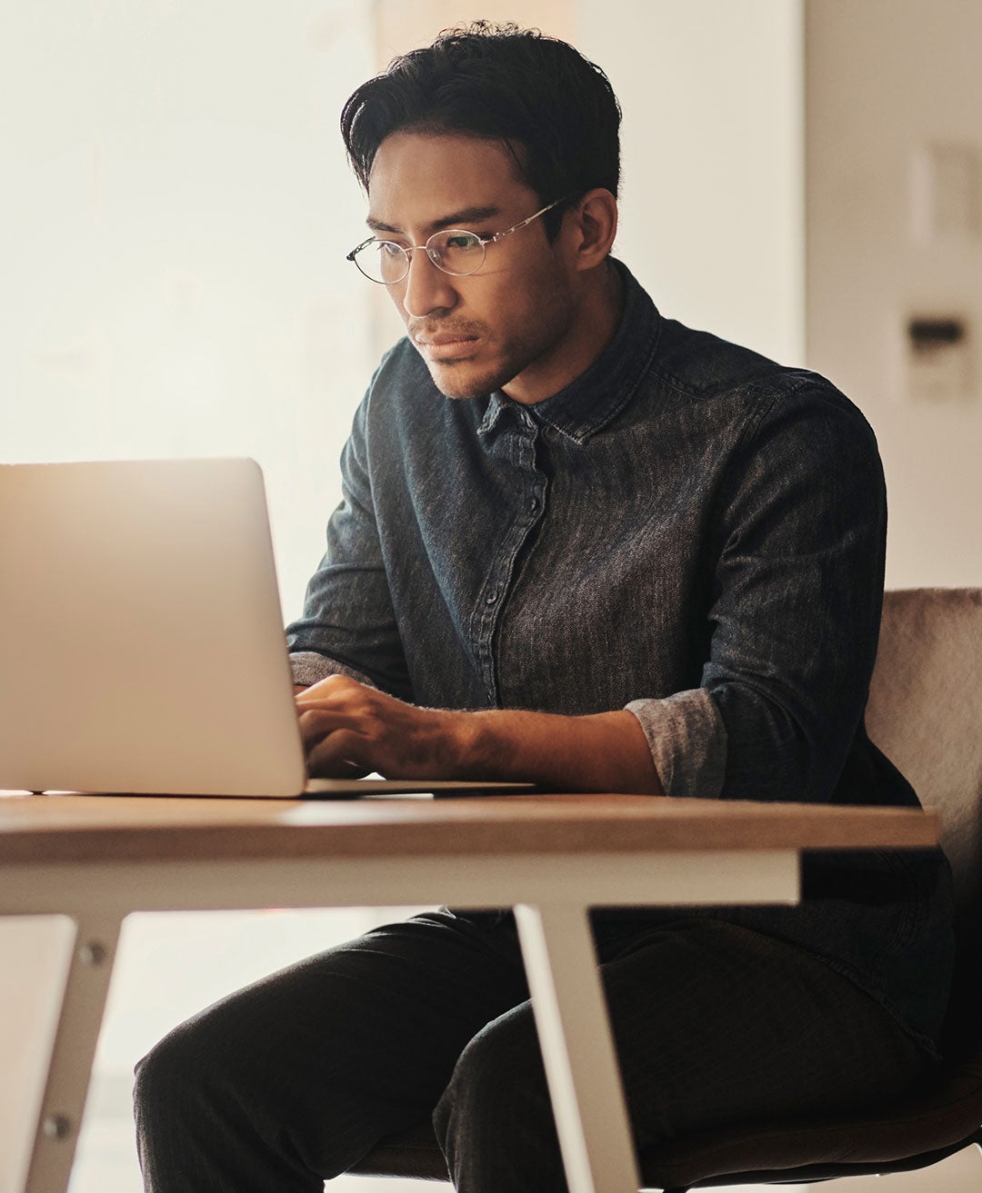 Image of a student taking an online exam at a testing center